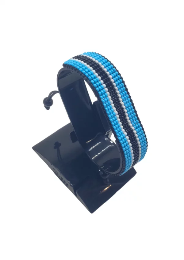 Handmade Botswana Adjustable Flag Bracelet featuring the colors of the Botswana flag on an adjustable bracelet.