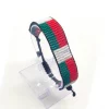 Madagascar Flag Bracelet Adjustable handcrafted with beadwork in the colors of the Madagascar flag.