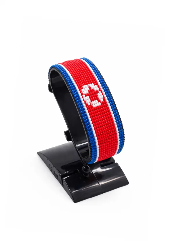 North Korea Flag Bracelet Adjustable handcrafted with beadwork in the colors of the North Korea flag.