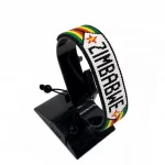 Zimbabwe Flag Bracelet With Name Adjustable handcrafted with beadwork in the colors of the Zimbabwe flag and the name "Zimbabwe".