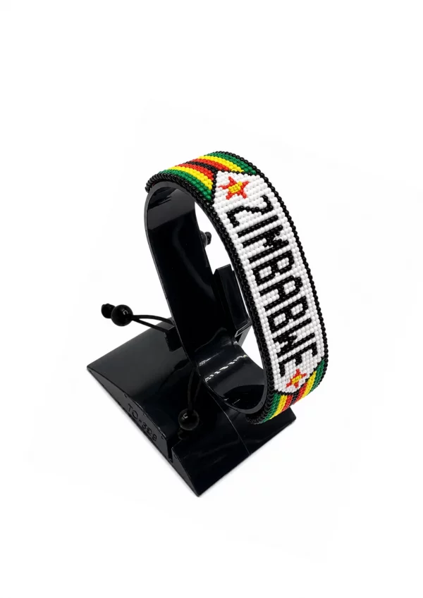 Zimbabwe Flag Bracelet With Name Adjustable handcrafted with beadwork in the colors of the Zimbabwe flag and the name "Zimbabwe".