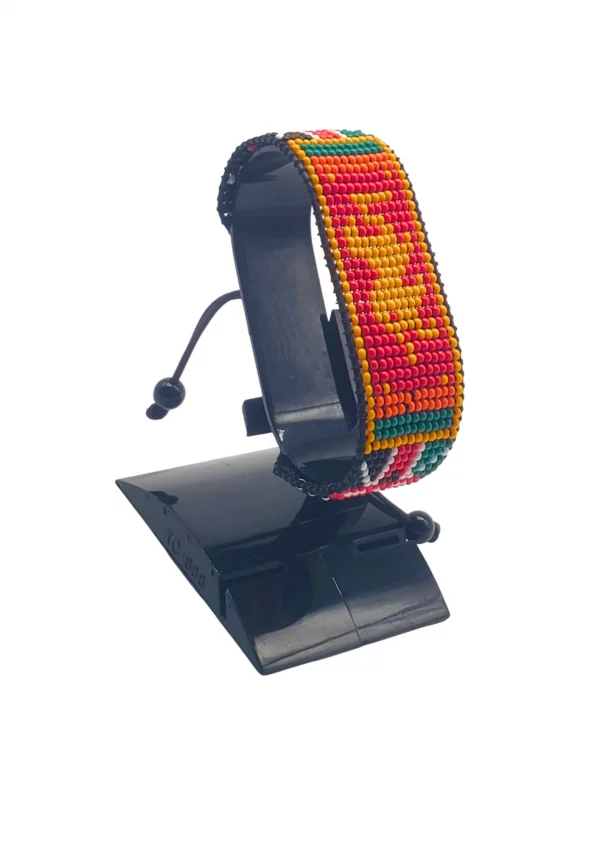 Bhutan Kenya Combo Flag Bracelet Adjustable handcrafted with beadwork in the colors of the Bhutan and Kenya flags.