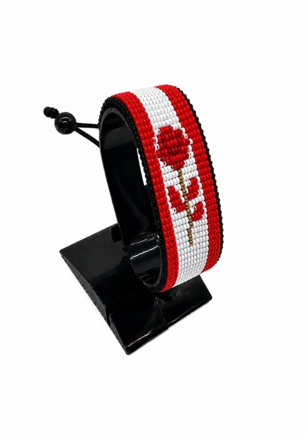Canada Flag Bracelet for Women handcrafted with beadwork in the colors of the Canada flag featuring an elegant rose centerpiece.