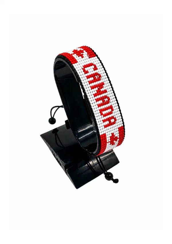 Canada Flag Bracelet With Name Adjustable handcrafted with beadwork in the colors of the Canada flag and the name "Canada".