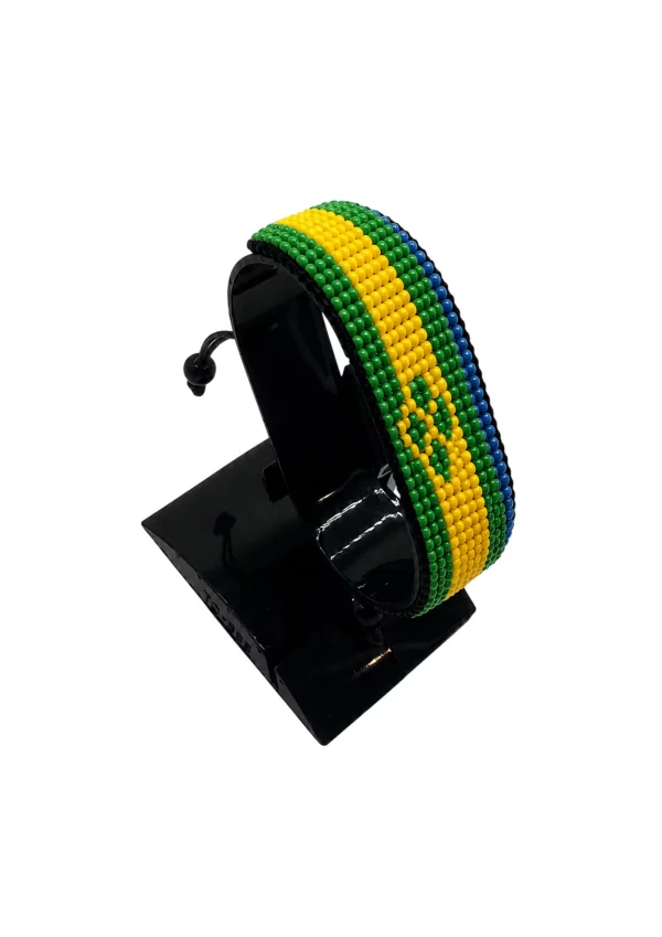 Saint Vincent and the Grenadines Flag Bracelet Adjustable handcrafted with beadwork in the colors of the Saint Vincent and the Grenadines flag.