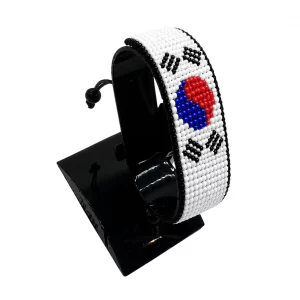 South Sudan Flag Bracelet Adjustable handcrafted with beadwork in the colors of the South Sudan flag.