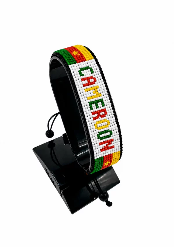 Cameroon Flag Bracelet With Name Adjustable handcrafted with beadwork in the colors of the Cameroon flag featuring the name CAMEROON.