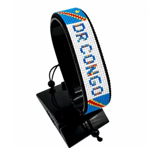 DR Congo Flag Bracelet With Name Adjustable handcrafted with beadwork in the colors of the Democratic Republic of the Congo flag featuring the name DR CONGO.