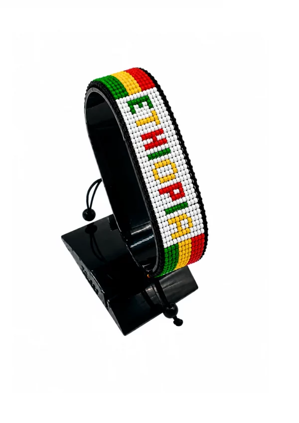 Ethiopia Flag Bracelet With Name Adjustable handcrafted with beadwork in the colors of the Ethiopia flag featuring the name ETHIOPIA.