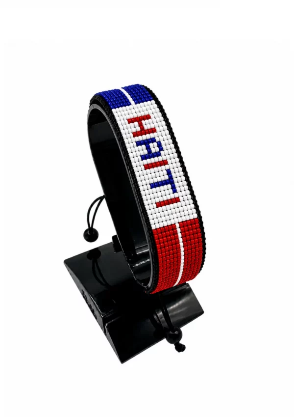 Haiti Flag Bracelet With Name Adjustable handcrafted with beadwork in the colors of the Haiti flag featuring the name HAITI.