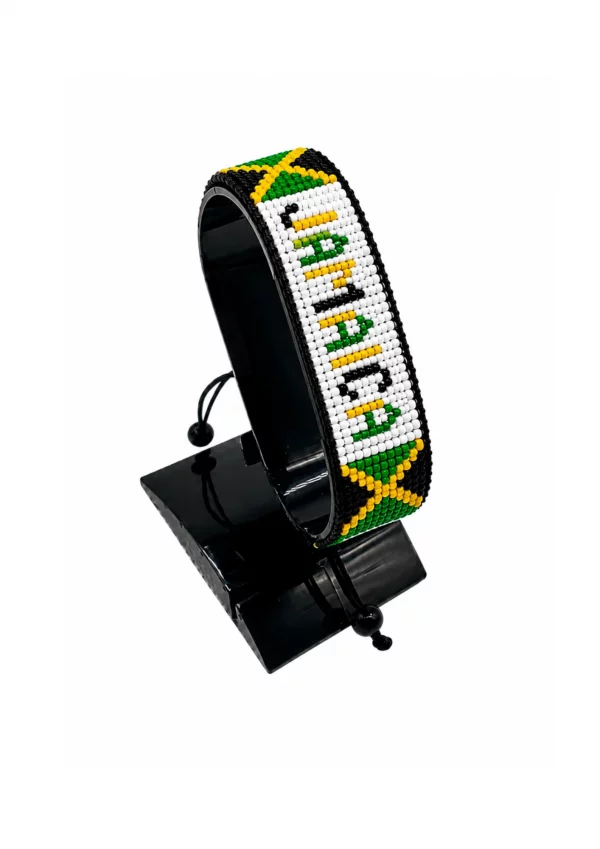 Jamaica Flag Bracelet With Name Adjustable handcrafted with beadwork in the colors of the Jamaica flag and the name "Jamaica".