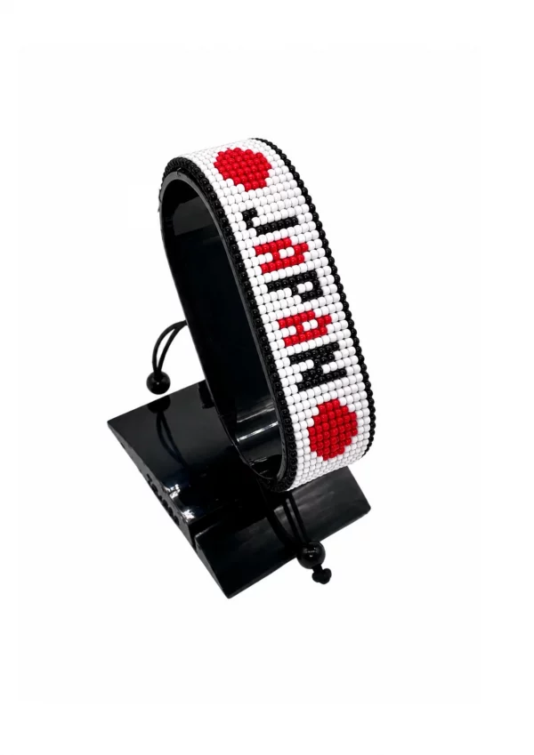 Japan Flag Bracelet With Name Adjustable handcrafted with beadwork in the colors of the Japan flag and the name "Japan".