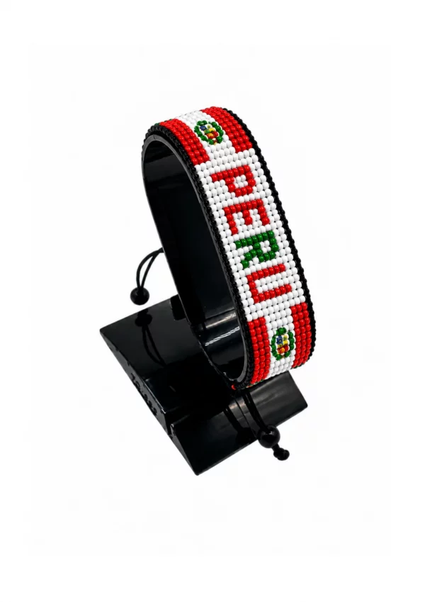 Peru Flag Bracelet With Name Adjustable handcrafted with beadwork in the colors of the Peru flag featuring the name PERU.
