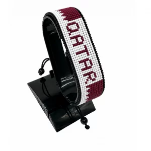 Qatar Flag Bracelet With Name Adjustable handcrafted with beadwork in the colors of the Qatar flag and the name "Qatar".