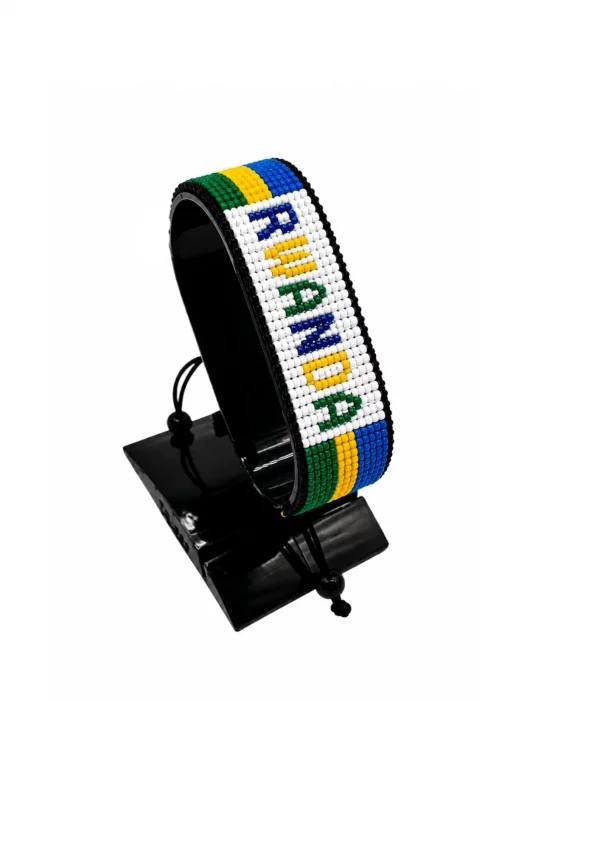 Rwanda Flag Bracelet With Name Adjustable handcrafted with beadwork in the colors of the Rwanda flag and the name "Rwanda".