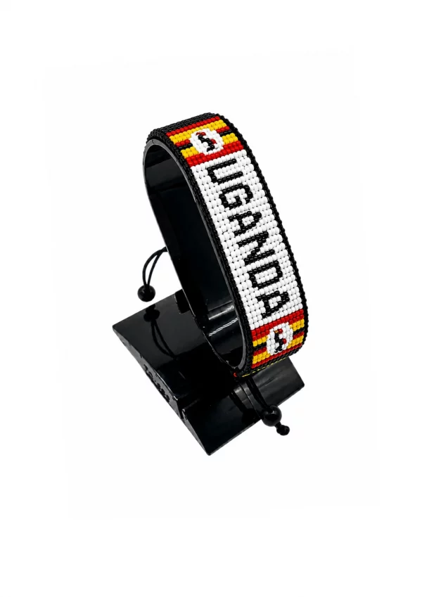 Uganda Flag Bracelet With Name Adjustable handcrafted with beadwork in the colors of the Uganda flag and the name "Uganda".