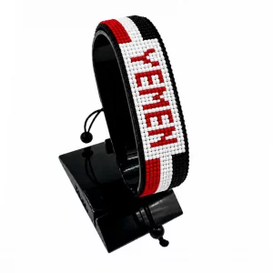 Yemen Flag Bracelet With Name Adjustable handcrafted with beadwork in the colors of the Ukraine flag featuring the name YEMEN.